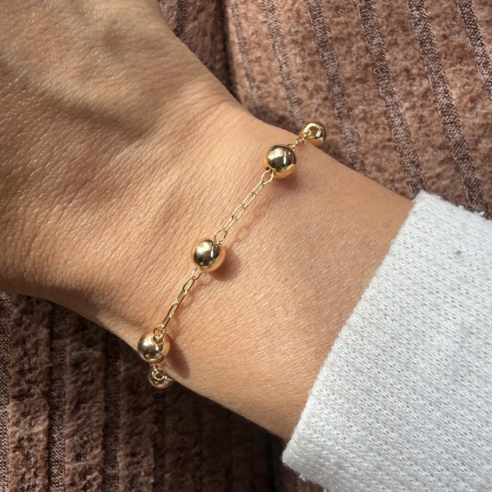 Pulsera pelotitas enchapada en dorado